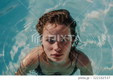 Young woman enjoying and relaxing in swimming pool water during holiday.Macro.AI Generative. 122182537