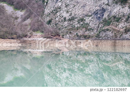 Mountain reflections in the Boivlla lake, Albania Mountain reflections in the Boivlla lake, Albania 122182697
