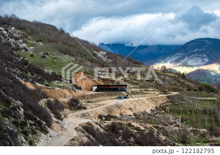 Dirty gravel road at Gamti Mountain towards the restaurant, Albania 122182795