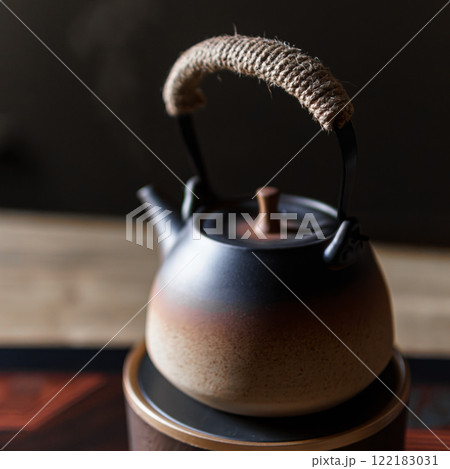 Beautifully designed and elegant Japanese Tea Kettle comes with a charming woven handle Beautifully designed and elegant Japanese Tea Kettle comes with a charming woven handle 122183031