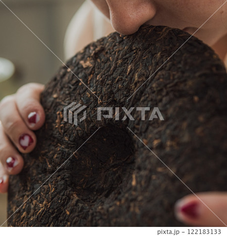 A person interacting with a unique natural artifact showcasing distinct features and design 122183133
