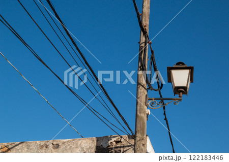 Lantern on a wooden pole, Lanzarote, Spain Lantern on a wooden pole, Lanzarote, Spain 122183446