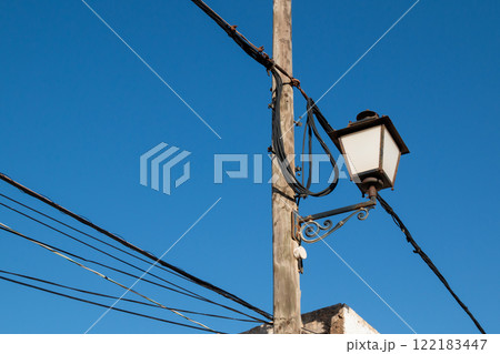 Lantern on a wooden pole, Lanzarote, Spain 122183447