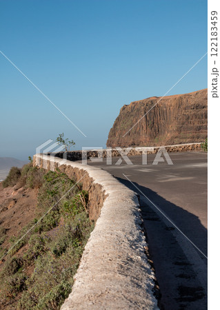 Stone fence and a mountain, Lanzarote, Spain 122183459