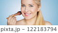 Woman, makeup and beauty, applying blush with a brush. Blonde beautiful woman, glowing skin and skincare routine, elegance and confidence idea 122183794
