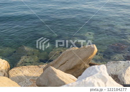 mound of large stones near the sea coast 122184277
