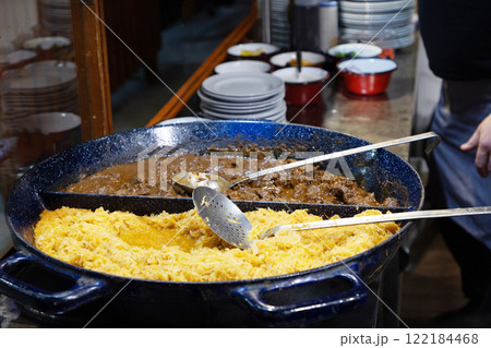 Big pan with Traditional irish stew served with mashed potatoes and cabbage. 122184468