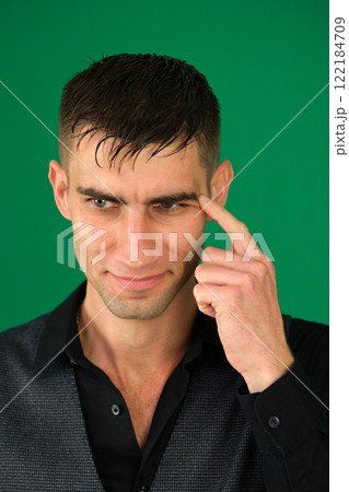Young handsome man with beard wearing casual sweater and glasses over blue background Thinking worried about a question, concerned and nervous with hand on chin Young handsome man with beard wearing casual sweater and glasses over blue background Thinking worried about a question, concerned and nervous with hand on chin 122184709