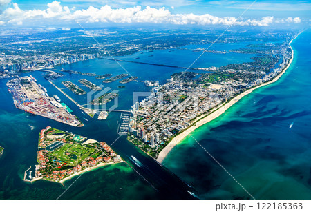 Aerial view of Miami Beach, Dodge Island, Fisher Island, and surrounding islands in Biscayne Bay, Florida, United States Aerial view of Miami Beach, Dodge Island, Fisher Island, and surrounding islands in Biscayne Bay, Florida, United States 122185363