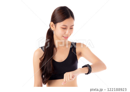 Happy young asian woman looking smartwatch for exercise and aerobics with cardio isolated. 122188923