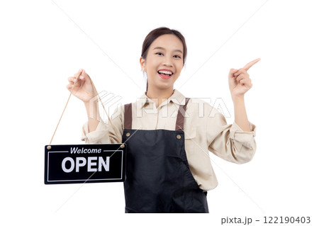 Young barista woman wearing apron holding open sign for inviting customer to enter with happiness. Young barista woman wearing apron holding open sign for inviting customer to enter with happiness. 122190403