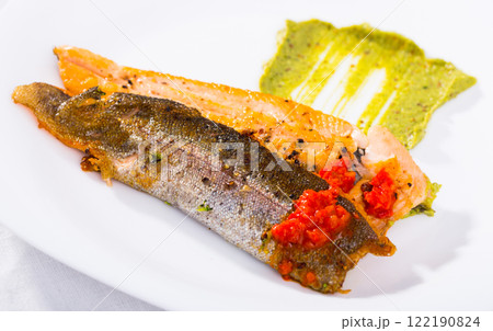 Roasted trout fillet with sauces Roasted trout fillet with sauces 122190824