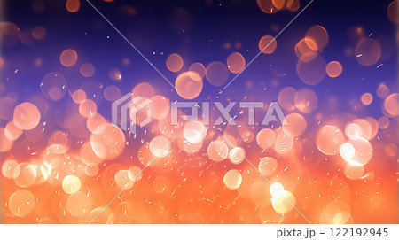 キラキラしたオレンジ色の光と火の粉が舞う背景. 122192945
