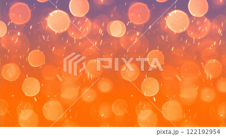 キラキラしたオレンジ色の光と火の粉が舞う背景. 122192954