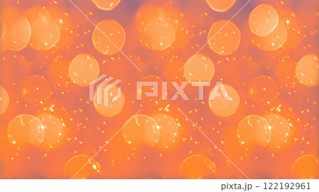 キラキラしたオレンジ色の光と火の粉が舞う背景. キラキラしたオレンジ色の光と火の粉が舞う背景. 122192961