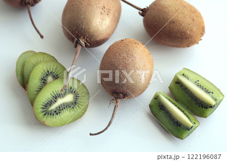 Group of kiwi with tails from home garden on white background. Eco-friendly pure natural product.  122196087