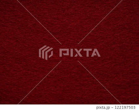 Velvety crimson whispers, the intimate embrace of a close-up in a red felt expanse 122197503