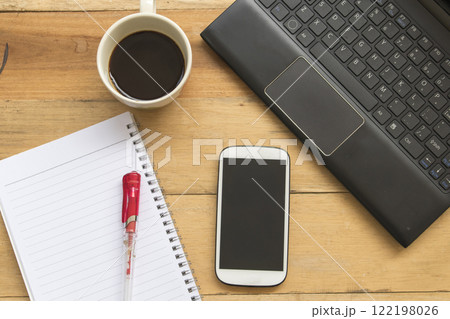 mobile phone, notebook planner, computer for business work  122198026