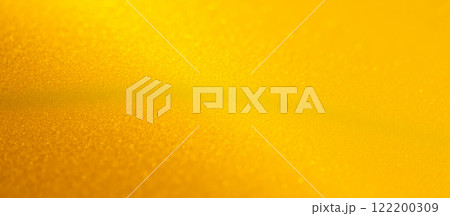 Bright golden yellow background with soft light texture, shimmering abstract surface, warm and glowing color, smooth pattern, perfect for design or decoration. Bright golden yellow background with soft light texture, shimmering abstract surface, warm and glowing color, smooth pattern, perfect for design or decoration. 122200309
