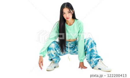 Trendy young Asian woman posing in colorful outfit on white background, stylish long hair, modern casual look, sporty clothing, urban fashion, youthful style, energetic pose Trendy young Asian woman posing in colorful outfit on white background, stylish long hair, modern casual look, sporty clothing, urban fashion, youthful style, energetic pose 122200413