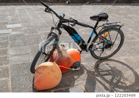 Bicycle and buoys, La Graciosa, Spain 122203499