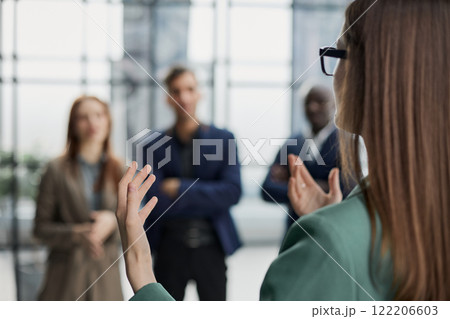 executive manager employer introducing welcoming newcomer to workmates. 122206603