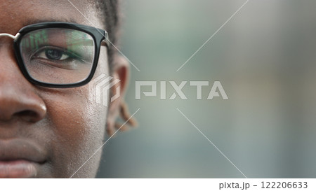 close-up of the face of a smiling African American man close-up of the face of a smiling African American man 122206633