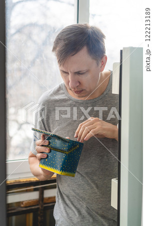 Adult man looking for tools Adult man looking for tools 122213189