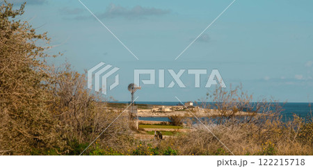 Coastal Windmill with Scenic View of the Sea and Nature Coastal Windmill with Scenic View of the Sea and Nature 122215718