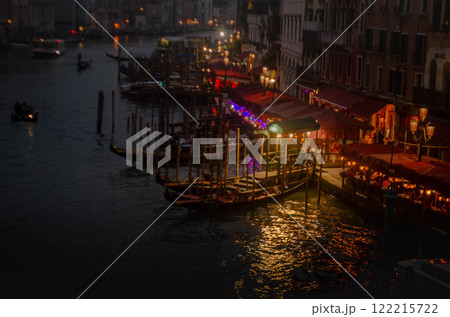 Venice Grand Canal at Night with Gondolas and Waterfront Lights Venice Grand Canal at Night with Gondolas and Waterfront Lights 122215722
