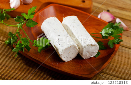 Soft goat cheese with herbs and garlic Soft goat cheese with herbs and garlic 122218518