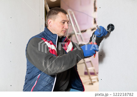 Electrician working with wires in apartment 122218782