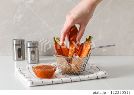 Fried carrot, concept of tasty fried food 122220512