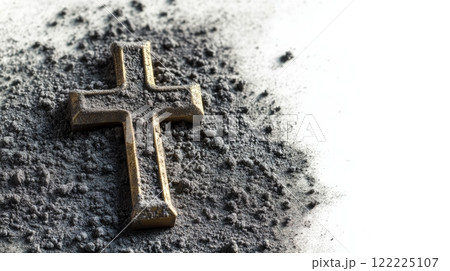 Cross is on top of a pile of dirt 122225107