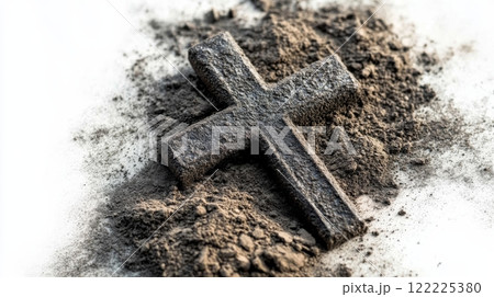 Cross is on top of a pile of dirt 122225380
