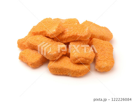 Heap of frozen breaded fish nuggets Heap of frozen breaded fish nuggets 122226084