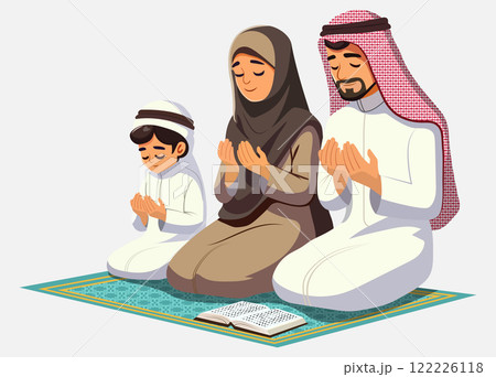 Muslim family, father, mother, and child dressed in traditional attire including hijab, kneeling together on prayer rugs as they perform their prayers. 122226118