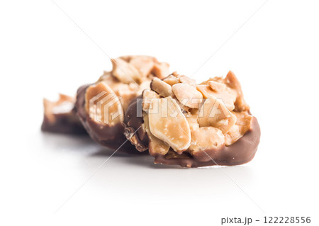 Photography of chocolate Florentines cookies with almonds and chocolate isolated on white background. Photography of chocolate Florentines cookies with almonds and chocolate isolated on white background. 122228556