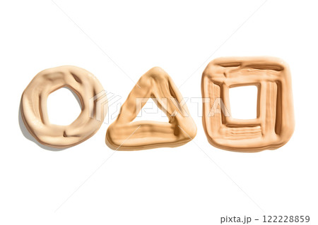 Assorted geometric shapes made from beige clay or putty on white background Assorted geometric shapes made from beige clay or putty on white background 122228859