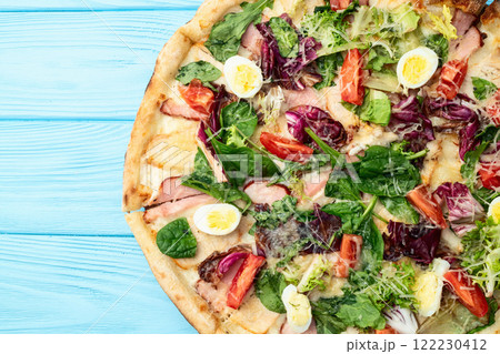 Italian pizza caesar with eggs salad chicken tomatoes and mozzarella photography. top view Italian pizza caesar with eggs salad chicken tomatoes and mozzarella photography. top view 122230412