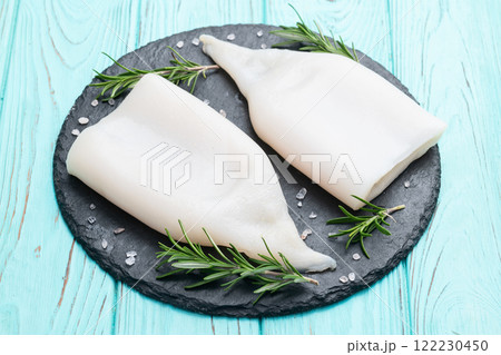 Squid tube and ring photography . Seafood top view 122230450