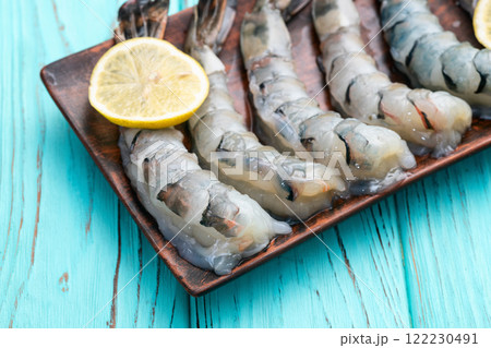 Raw big tiger ( king ) shrimps Cleaned, Peeled & Deveined photography . Top view 122230491