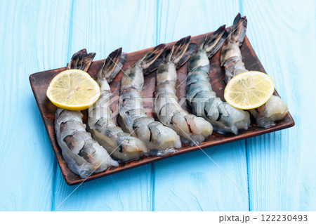 Raw big tiger ( king ) shrimps Cleaned, Peeled & Deveined photography . Top view 122230493