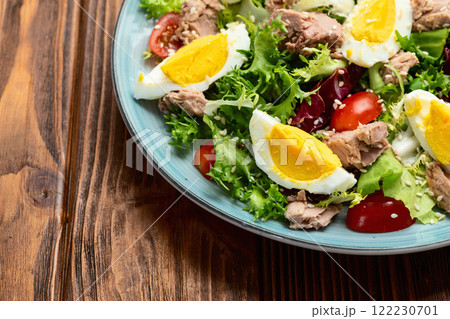 Canned Tuna salad with eggs and tomatoes photography . Top view Canned Tuna salad with eggs and tomatoes photography . Top view 122230701