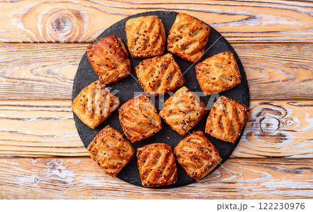 Homemade mini puff pastries with meat photography . Top view Homemade mini puff pastries with meat photography . Top view 122230976