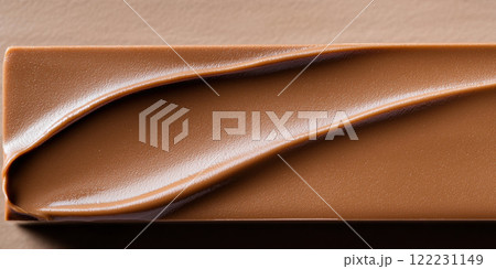 Smooth chocolate texture with rich, creamy swirls and glossy finish 122231149