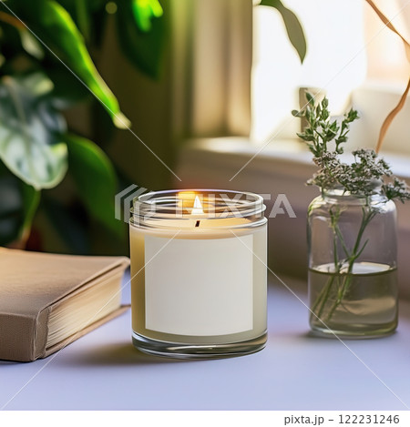 Clear glass jar candle mockup, scented candle jar with blank white label, styled interior candle design template 122231246