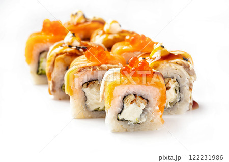 Closeip image of classic philadelphia sushi rolls with salmon, cream cheese, eel and red caviar isolated at white background. 122231986