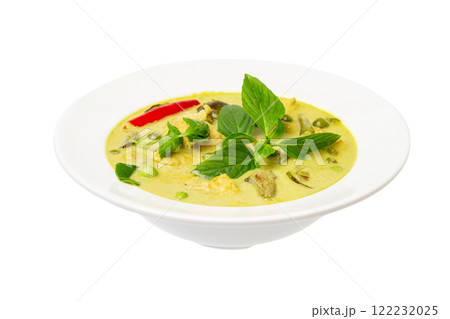 Closeup plate of thraditional thailand meal - green curry with chicken and eggplants served in a plate isolated at white background. Closeup plate of thraditional thailand meal - green curry with chicken and eggplants served in a plate isolated at white background. 122232025