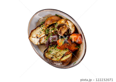 Plate of grilled vegetables - potato, pumpkin and mushrooms isolated at white background. Plate of grilled vegetables - potato, pumpkin and mushrooms isolated at white background. 122232071